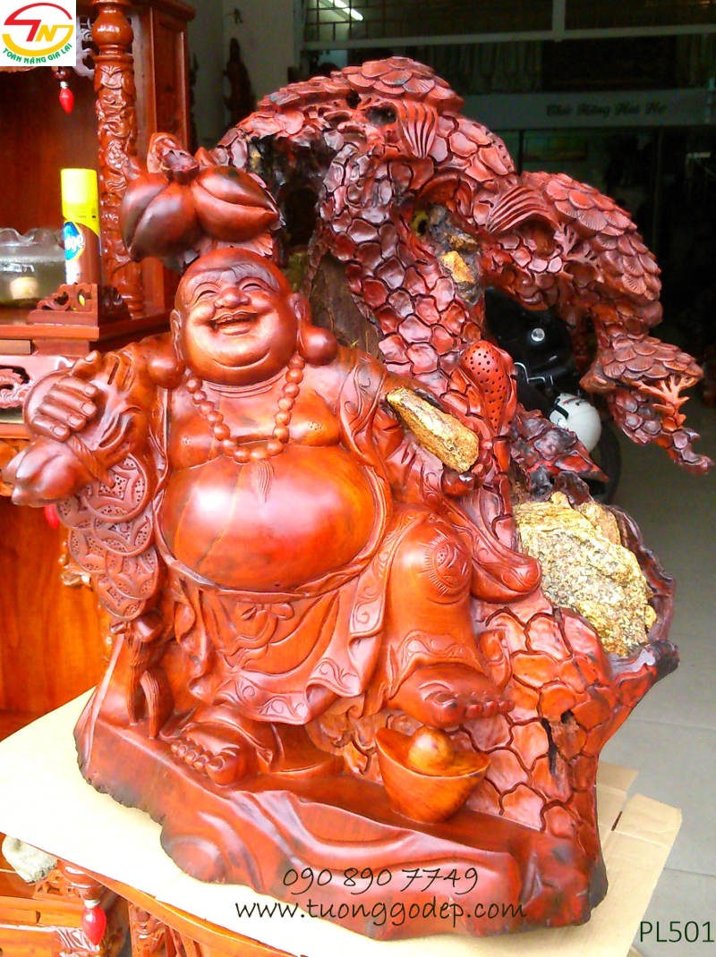 Phật Di Lặc gỗ hương ôm đá