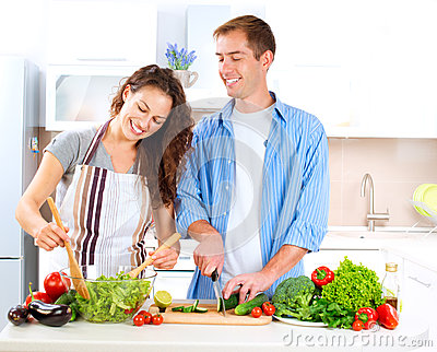 couple-cooking-together-27255887.jpg
