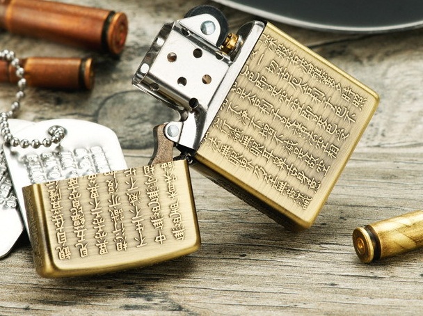 Zippo đồng kinh phật dập nổi